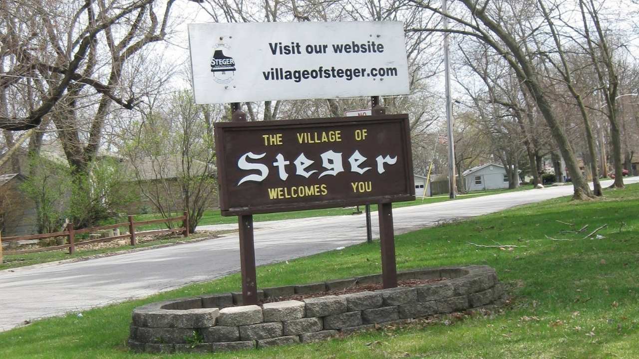 village of steger illinois roadside sign with text "the village of Steger welcomes you"