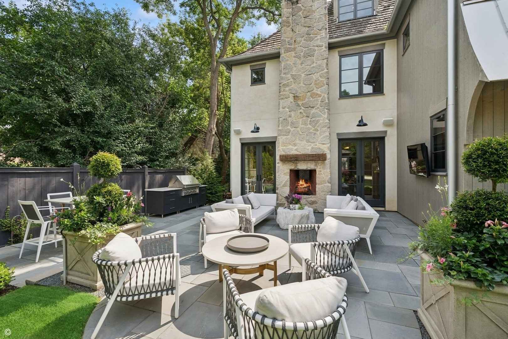 back yard with paver patio with back of 2 story home in hinsdale