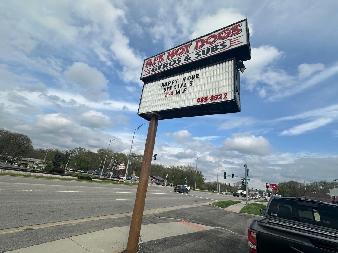 street sign at AJs hot dogs, gyros & subs new lenox IL